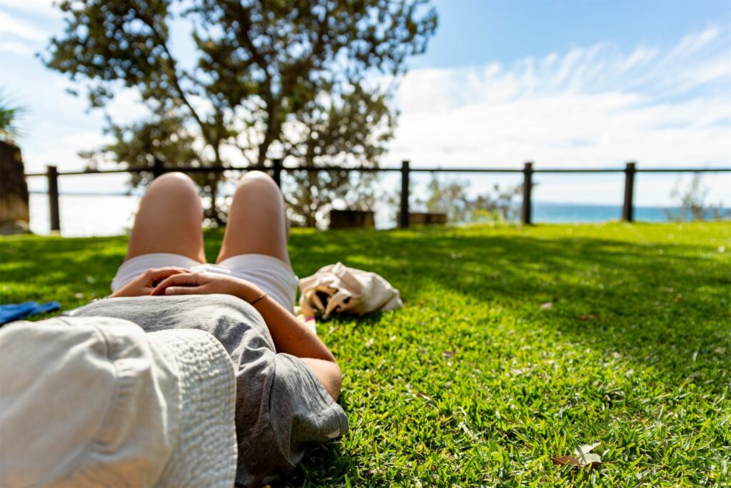 Woman laying down in Noosa National Park